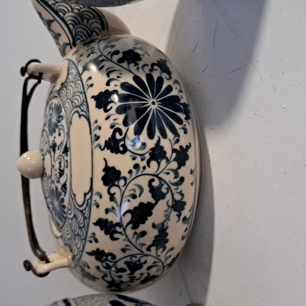 Tea pot with cups and candy dish